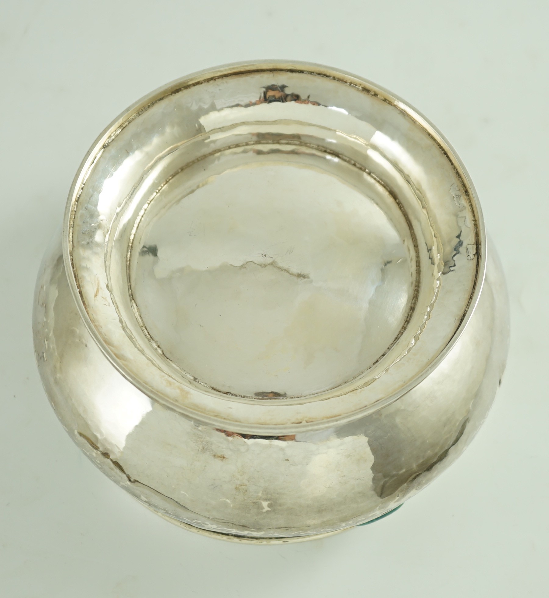 An Edwardian Art Nouveau silver pedestal bowl, inset with four oval Ruskin oval cabochons, by Albert Edward Jones